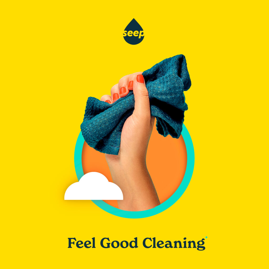 Hand holding a blue cleaning sustainable bamboo cloth centered in a cyan circle on a bright yellow background with the text Feel Good Cleaning vsmpaign slogan