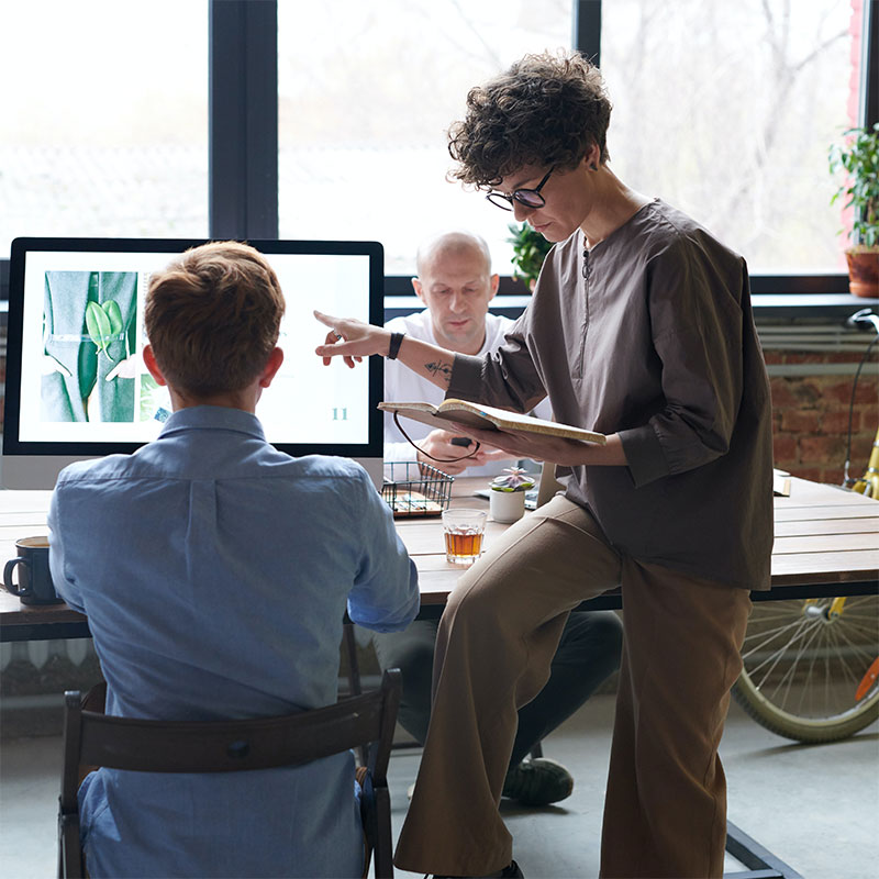 Two designers reviewing a project at a London creative studio fot. PEXELS